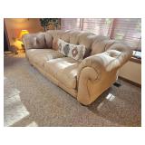 Cream Tufted Leather Sofa with Rolled Arms