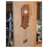 Ornately Carved Wooden Wall Clock with Chain Weights