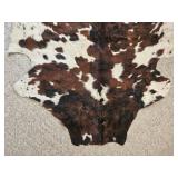 Large Brown and White Cowhide Area Rug