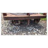 Red industrial carts, cast wheels, 2 swivel, along with some 3/8 cable and roll of wire