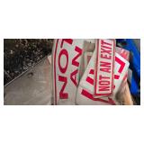 Assorted Electrical Conduit Fittings and building safety signs