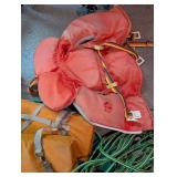 Personal flotation devices and throwable rescue lines