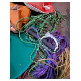 Personal flotation devices and throwable rescue lines