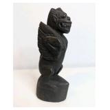 Vintage, hand-carved wooden figurine reminiscent of Balinese or Southeast Asian mythology