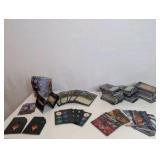 Unsorted Magic: The Gathering cards, including various decks, stacks of sorted cards, and tokens or counters