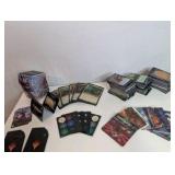 Unsorted Magic: The Gathering cards, including various decks, stacks of sorted cards, and tokens or counters