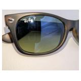 Ray-Ban New Wayfarer sunglasses in a classic tortoise shell pattern