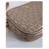 Michael Kors metallic rose gold monogram wristlet, Like New