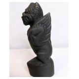 Vintage, hand-carved wooden figurine reminiscent of Balinese or Southeast Asian mythology