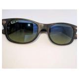 Ray-Ban New Wayfarer sunglasses in a classic tortoise shell pattern