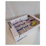 12-piece Room Essentials Annika Flatware Set, a vibrant iridescent rainbow finish