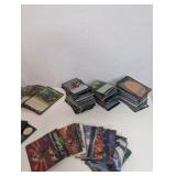 Unsorted Magic: The Gathering cards, including various decks, stacks of sorted cards, and tokens or counters