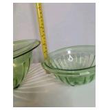 Vintage green depression glass mixing bowls, glow under uv