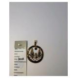 14K yellow gold pendant, detailed trees and mountains