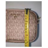 Michael Kors metallic rose gold monogram wristlet, Like New