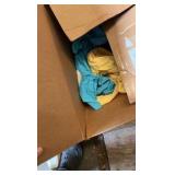 Two boxes containing various shirts.