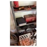 Metal shelving unit and contents