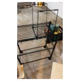 Rolling rack and workout equipment.