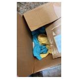 Two boxes containing various shirts.