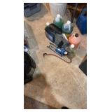 A lot of car supplies, including car wash, pump, and Pro Lift mat.