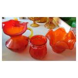 Assorted Orange Art Glass Pieces