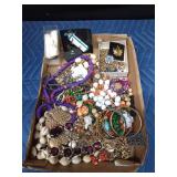 Flat of jewelry including sterling silver, Black hills gold necklace and Arlo Artwork