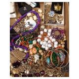 Flat of jewelry including sterling silver, Black hills gold necklace and Arlo Artwork