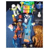 Box of toys including Tonka and Fisher Price