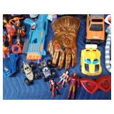 Box of toys including Tonka and Fisher Price