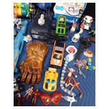 Box of toys including Tonka and Fisher Price