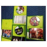 5 Xbox 360 games in cases and 2 empty cases