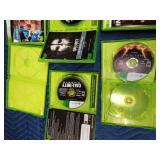 5 Xbox 360 games in cases and 2 empty cases