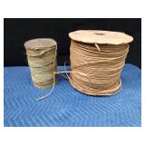 Roll of twine and large roll of paper twine
