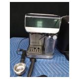 Gourmia automatic expresso maker with accessories and a Keurig