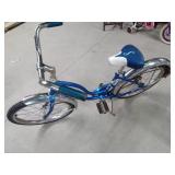 1977 Schwinn Bantum Stingray Muscle Bike with chrome fenders and 1976 Schwinn Breeze Bike with rear baskets