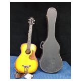 Vintage Harmony Stella guitar with case and extra strings