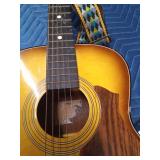 Vintage Harmony Stella guitar with case and extra strings