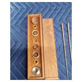 Alignment box for gravure etched cylinders known as print rings and butcher tools in wood bat like case (tools look like needles)
