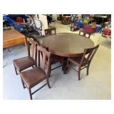 Vintage Solid Wood Round Table on Casters with 6 Chairs - has 2 leafs