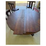 Vintage Solid Wood Round Table on Casters with 6 Chairs - has 2 leafs