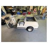 AMF Harley Davidson golf cart with a vise on back mounted board