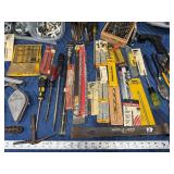 Tote of new and used hardware and tools
