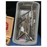 Tote of new and used hardware and tools