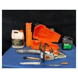 Stihl Chainsaw with approximately 2 gal bar oil and 1 gal bar oil and accessories