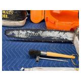 Stihl Chainsaw with approximately 2 gal bar oil and 1 gal bar oil and accessories