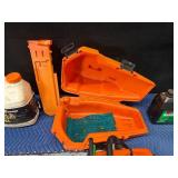 Stihl Chainsaw with approximately 2 gal bar oil and 1 gal bar oil and accessories
