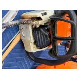 Stihl Chainsaw with approximately 2 gal bar oil and 1 gal bar oil and accessories
