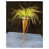 Metal plant stand with artificial plant