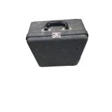 vintage Royal Quiet De Luxe portable typewriter from the 1930s or 1940s, enclosed in its original black metal carrying case.