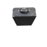 vintage Royal Quiet De Luxe portable typewriter from the 1930s or 1940s, enclosed in its original black metal carrying case.